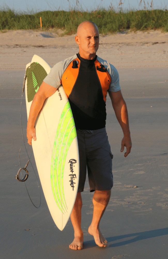 Surfer wearing lifejacket alternative Lifeshirt